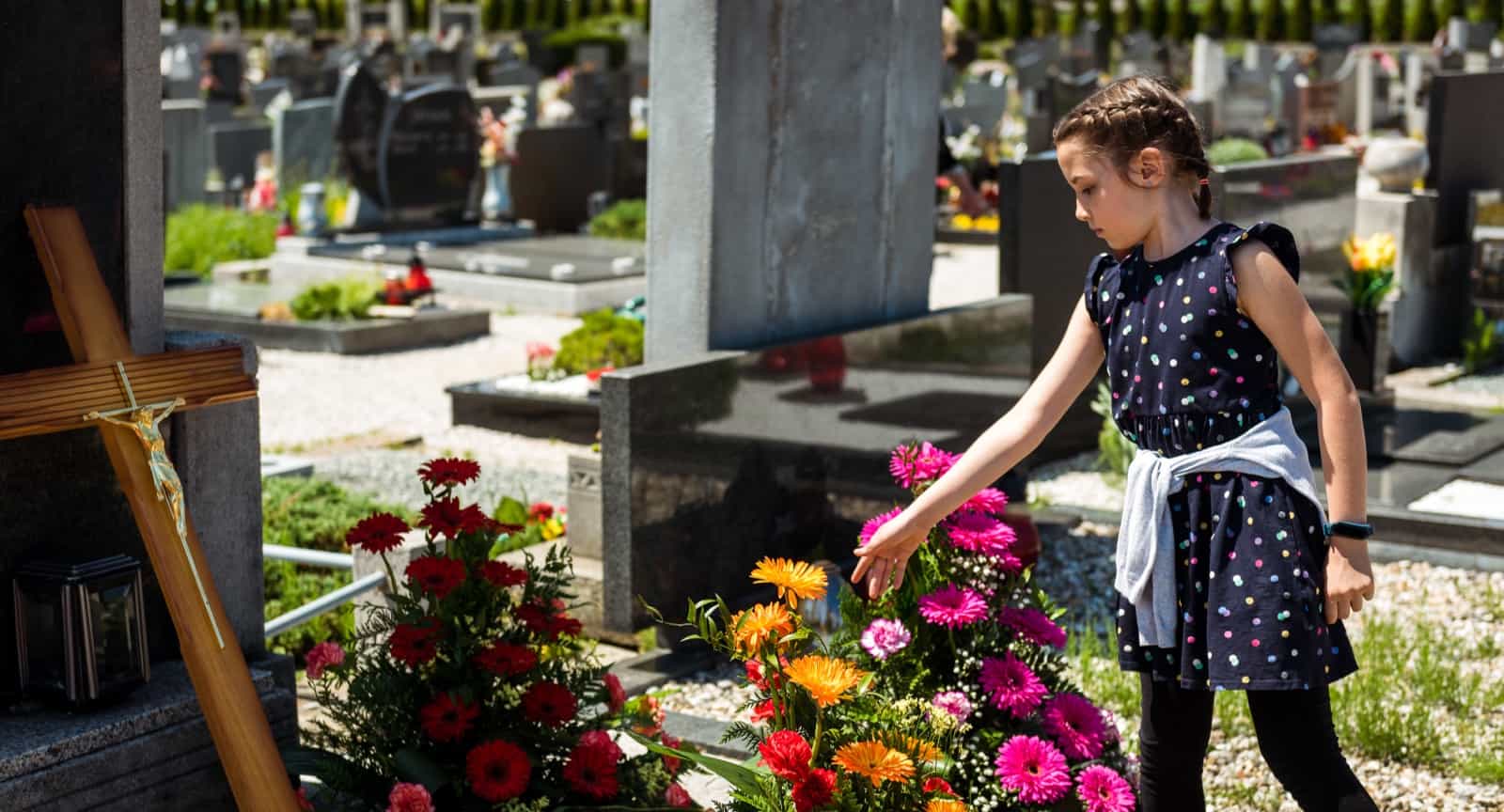 child in graveyard